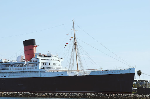 big black and white ship in the Long beach harbour